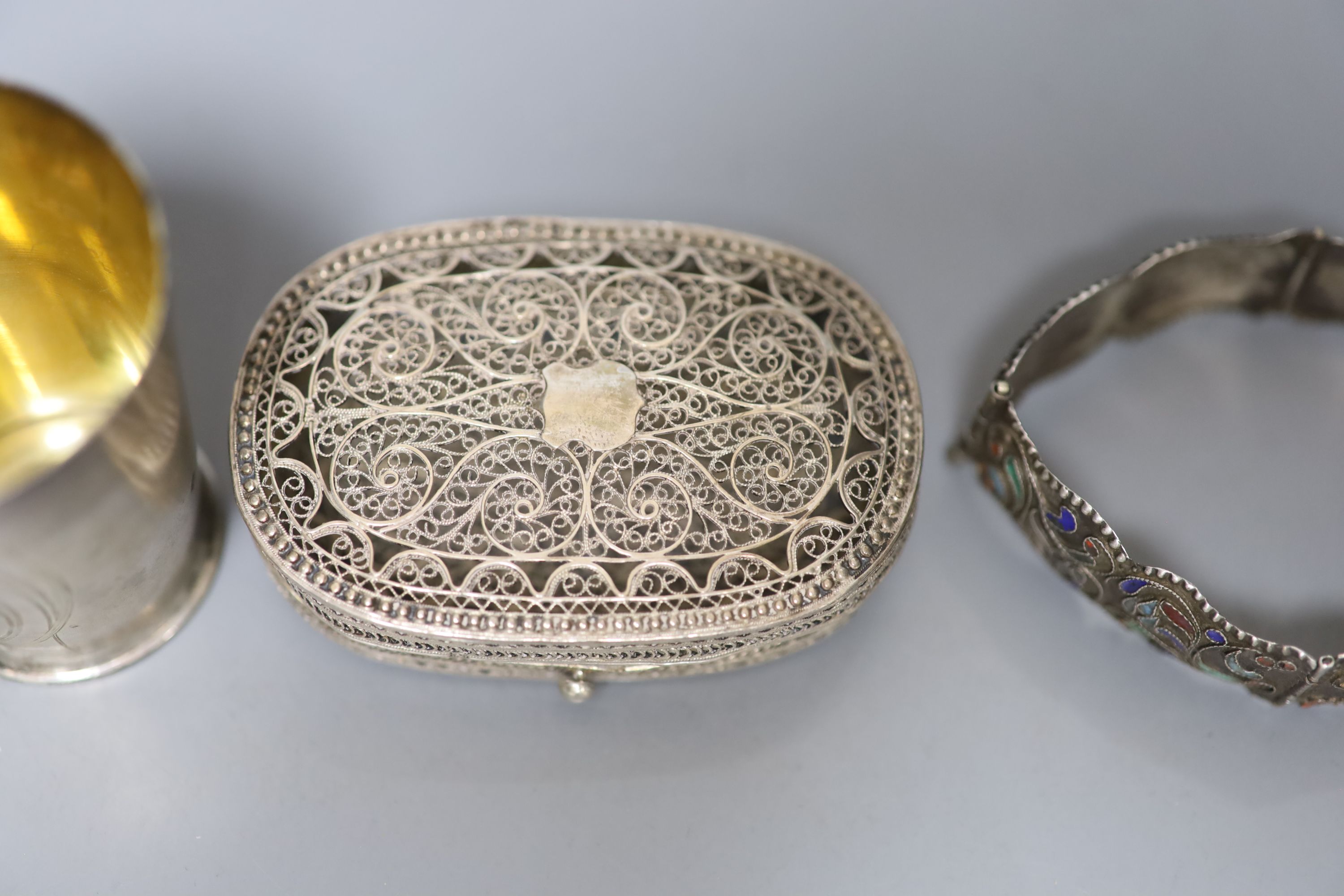 Six assorted early 20th century Russian 84 zolotnik tots, tallest 74mm, a similar enamelled bracelet and a filligree box